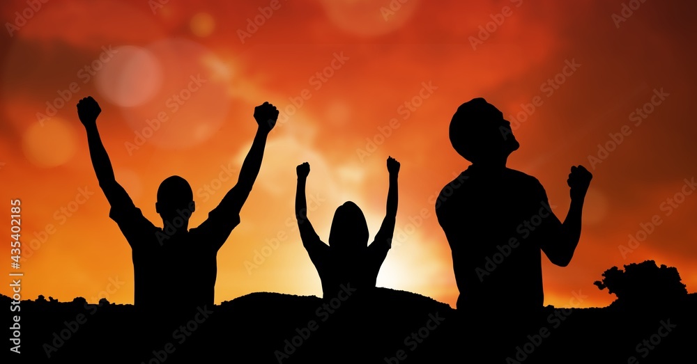 Composition of silhouettes of sports fans cheering on red background