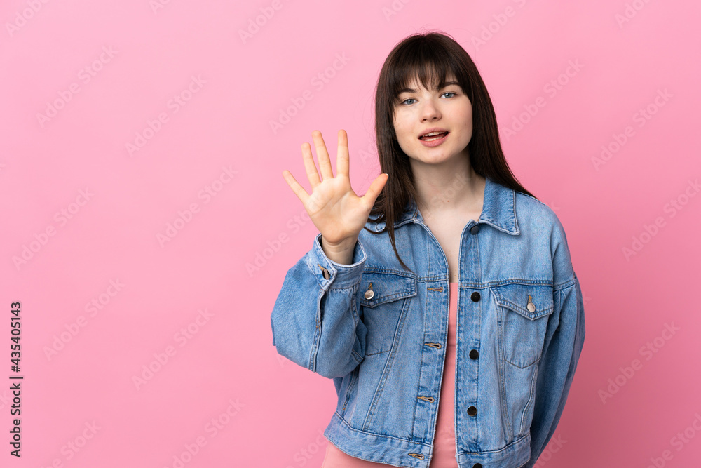 Young Ukrainian woman isolated on pink background counting five with fingers Young Ukrainian woman isolated on pink background counting five with fingers