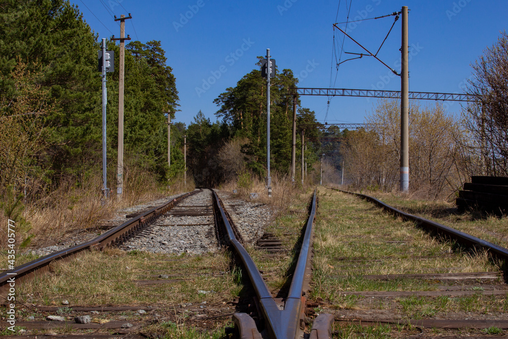 Fototapeta premium Railroad tracks and infrastructure. Old railroad tracks, turnouts and semaphores.