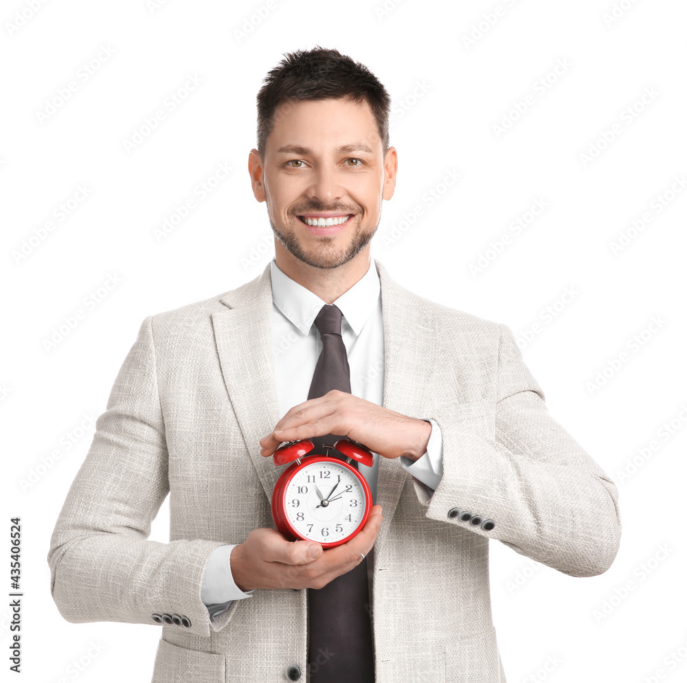 Happy businessman holding alarm clock on white background. Time management Happy businessman holding alarm clock on white background. Time management