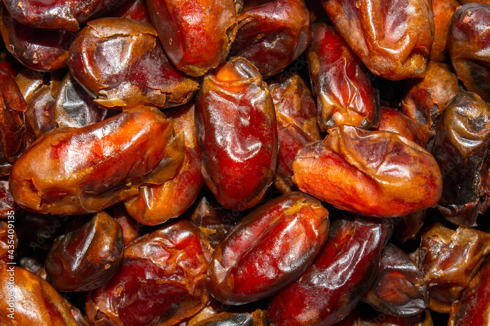 Dried dates background top view.Background of ripe dried dates.
