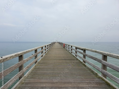 wooden bridge over the sea