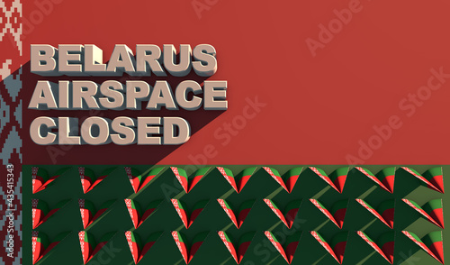 White lettering BELARUS AIRSPACE CLOSED on the background of the flag and small paper airplanes photo