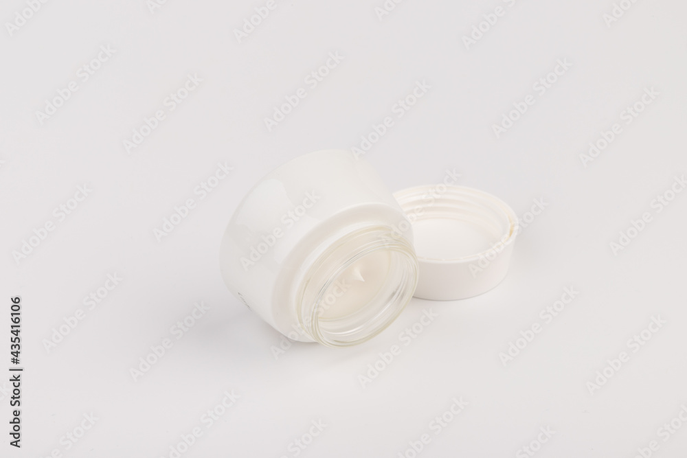 Beauty Cream Texture Close Up. Cosmetic Skincare Product In Jar On White Background. High Quality