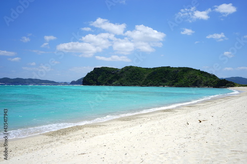 Beautiful tropical island. Calm waves on the blue water. Ino Beach in Zamami island  Okinawa  Japan -                                            