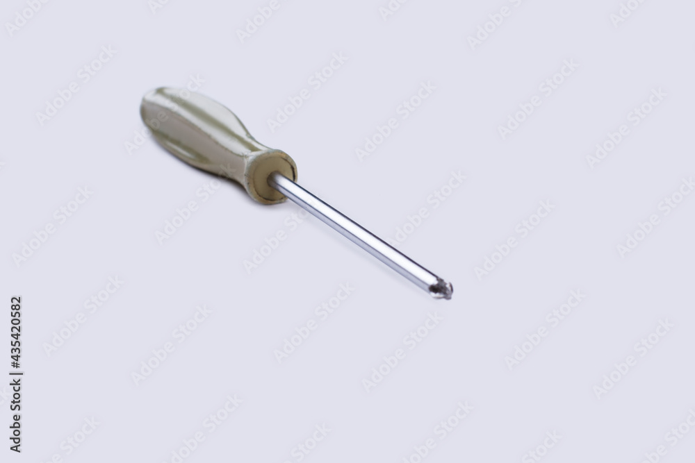 Screwdriver with plastic handle on white background. Screwdriver with plastic handle on white background.