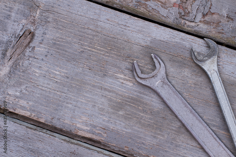 Wrenches on old wooden boards. Wrenches on old wooden boards.