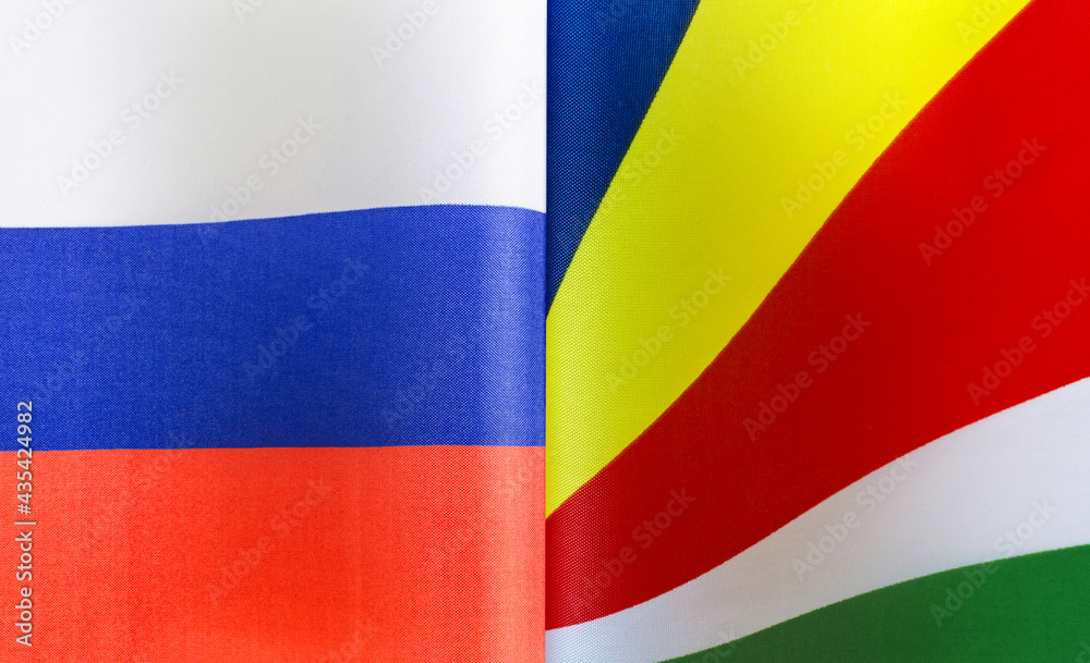 fragments of the national flags of Russia and the Republic of Seychelles close-up fragments of the national flags of Russia and the Republic of Seychelles close-up