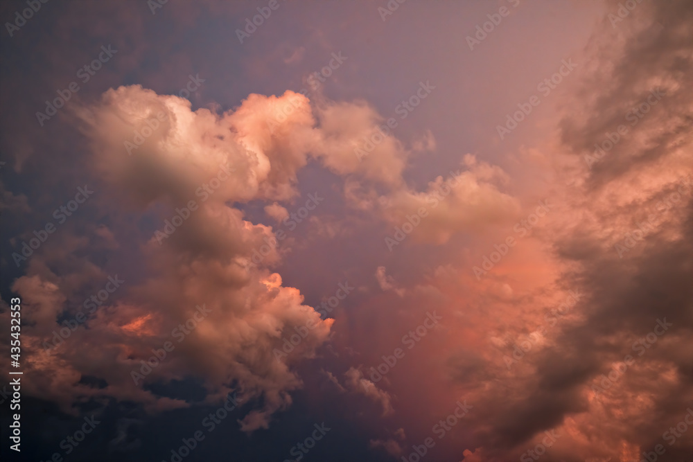 Majestic clouds illuminated by sunset light