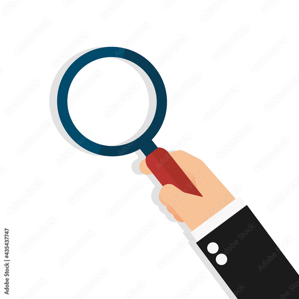 Business hand holding a magnifying glass Business hand holding a magnifying glass