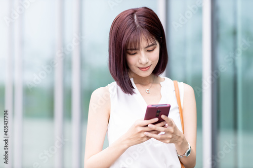 businesswoman use smart phone