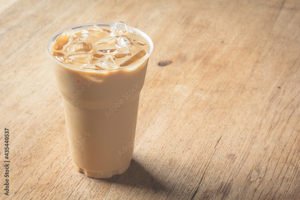 ice coffee on wooden table ice coffee on wooden table