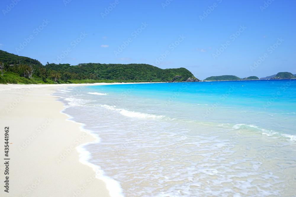 Beautiful summer scenery. calm waves on the blue water. Furuzamami Beach in Zamami island, Okinawa, Japan - 日本 沖縄 座間味島 古座間味ビーチ 青い海	