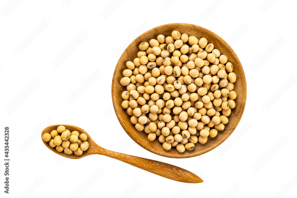 Top view of soy beans in wooden plate and in wooden spoon on white background with clipping path. Top view of soy beans in wooden plate and in wooden spoon on white background with clipping path.