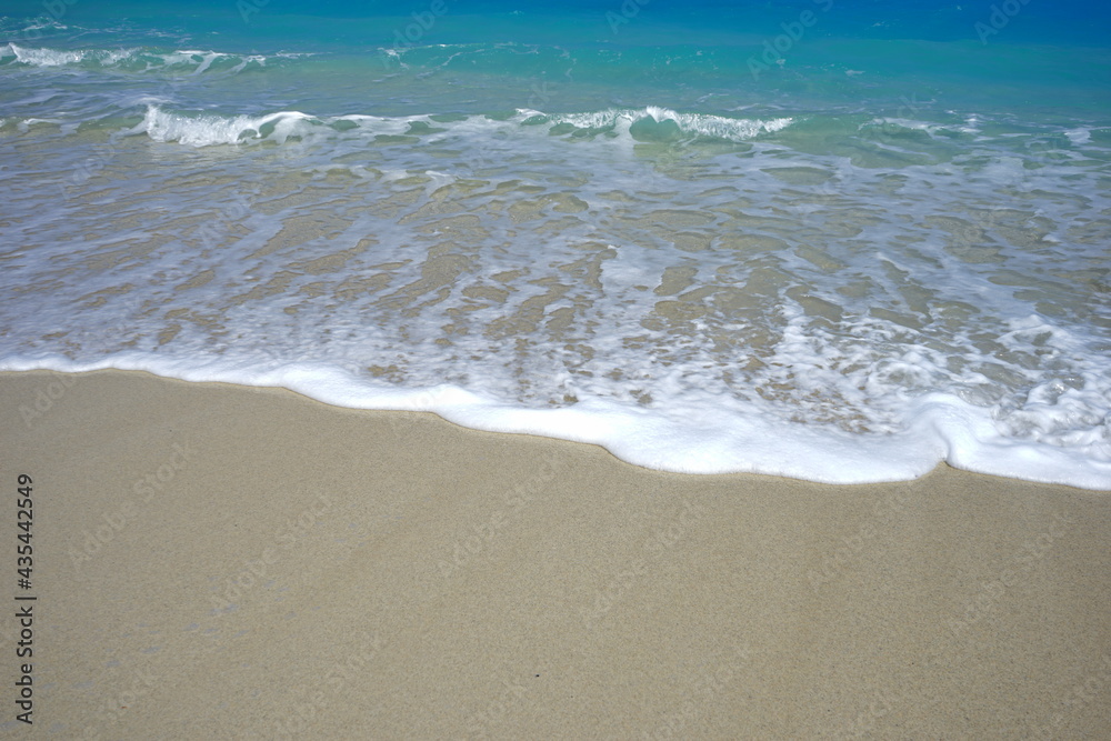 Beautiful summer scenery. calm waves on the blue water. Furuzamami Beach in Zamami island, Okinawa, Japan - 日本 沖縄 座間味島 古座間味ビーチ 青い海 Beautiful summer scenery. calm waves on the blue water. Furuzamami Beach in Zamami island, Okinawa, Japan - 日本 沖縄 座間味島 古座間味ビーチ 青い海