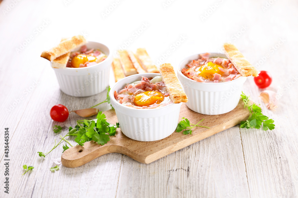 baked egg with bacon and bread toast baked egg with bacon and bread toast