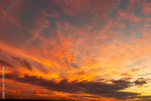 Stunning colorful clouds at the sky. Amazing view on the dramatic sunset sky © EdVal