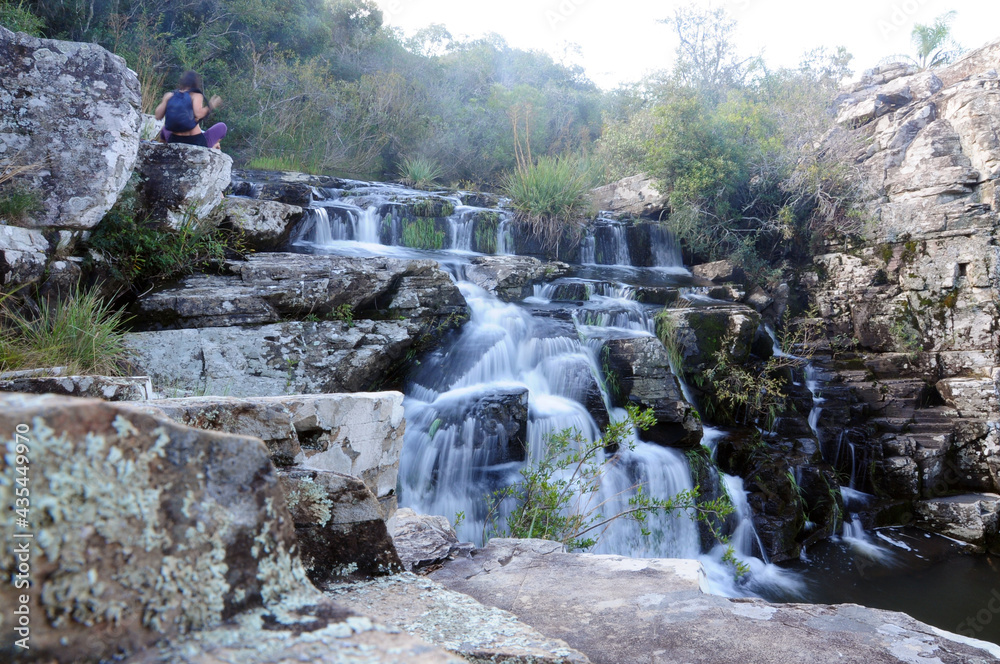 Small waterfalls that flow through the vegetation of the Quebrada de los Cuervos National Park in Trenta y Tres, Uruguay - obrazy, fototapety, plakaty 