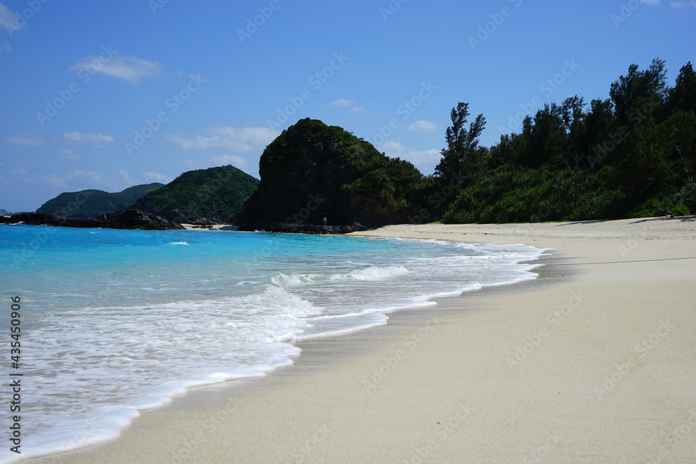 Beautiful summer scenery. calm waves on the blue water. Furuzamami Beach in Zamami island, Okinawa, Japan - 日本 沖縄 座間味島 古座間味ビーチ 青い海	