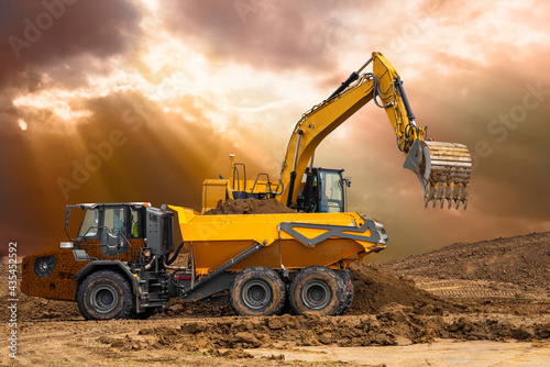 excavator at work on construction site