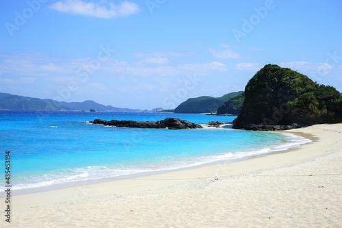 Beautiful summer scenery. calm waves on the blue water. Furuzamami Beach in Zamami island, Okinawa, Japan - 日本 沖縄 座間味島 古座間味ビーチ