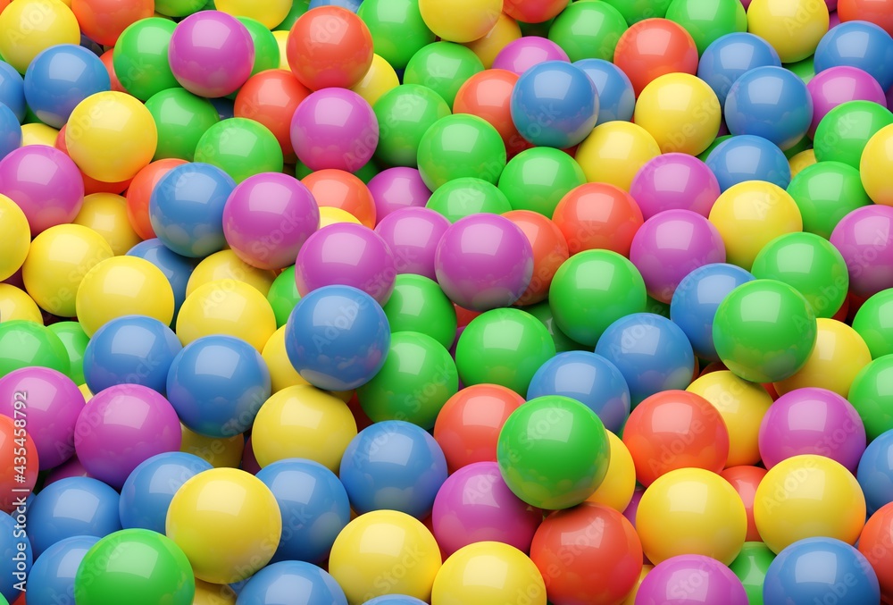 Obraz premium Ball pool or pit filled with red, green, yellow, pink and blue plastic balls, abstract texture background