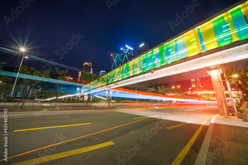 Photography modern buildings in china shenzhen futian CBD from elevated walkway at night