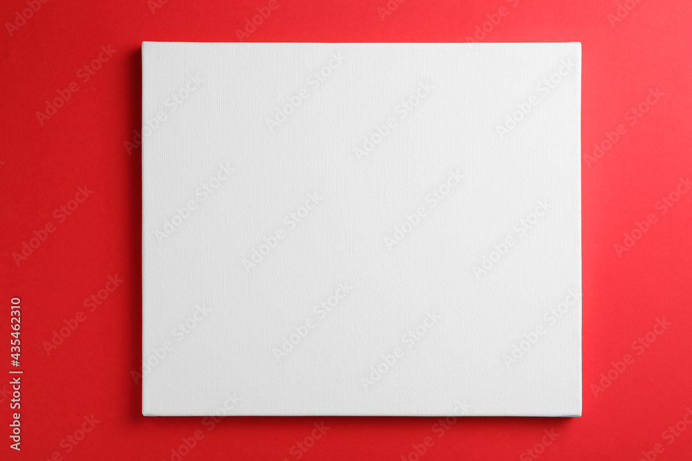 Fototapeta premium Blank canvas on red background, space for text