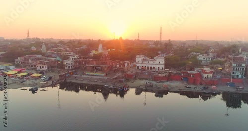 Cinematic Aerial View of Brahmavart Ghat, Sunset Near River Ganga, Kanpur, Uttar Pradesh, India. photo