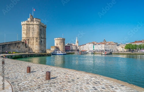 Two medieval towers at Old Port harbour at La Rochelle France photo