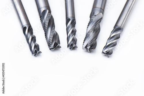 endmill set. cutting tools special. spiral right hand Four-teeth . material Carbide and high speed steel, coating Titanium nitride. isolated on white background.