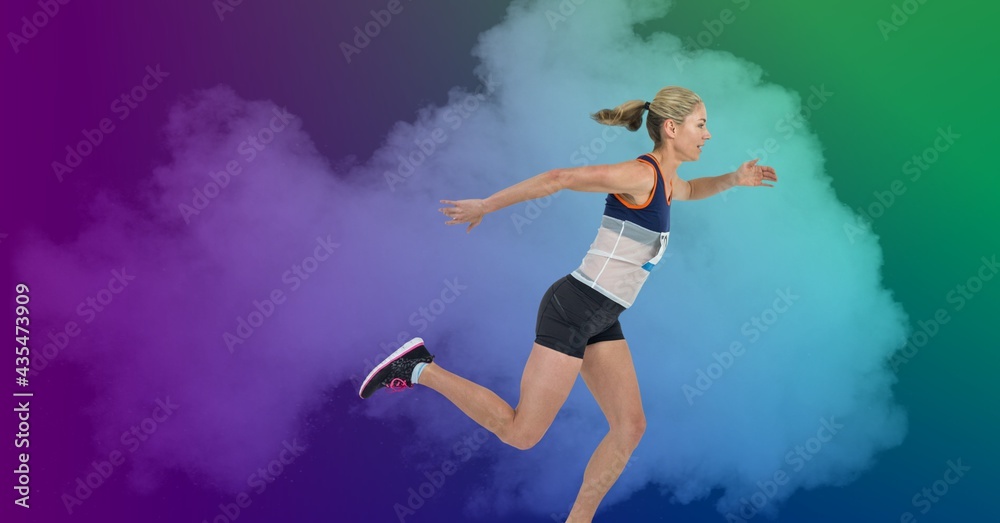 Composition of athletic woman running over smoke on colorful background