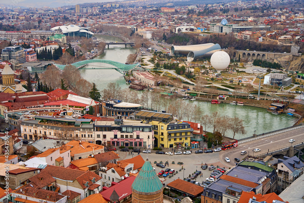 Panorama of Tbilisi from above. Old town center. The Kura River