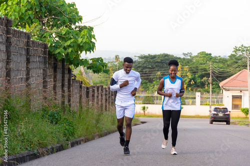 young man and woman going for a jog