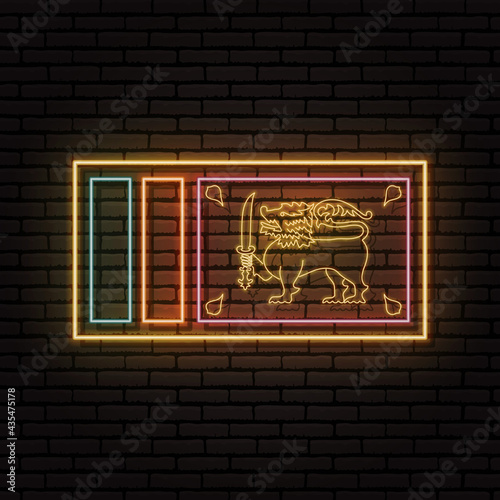 Neon sign in the form of the flag of Sri Lanka. Against the background of a brick wall with a shadow. For the design of tourist or patriotic themes.