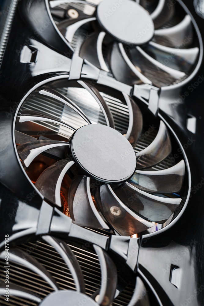 A video card with three fans is hardly a powerful cooling system.