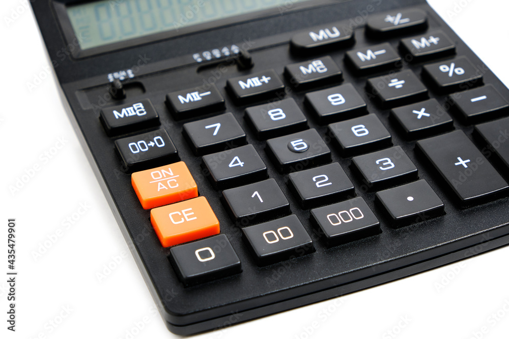 Black calculator on white background, isolate. Black calculator on white background, isolate.