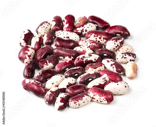 pile of red speckled kidney beans closeup on white photo