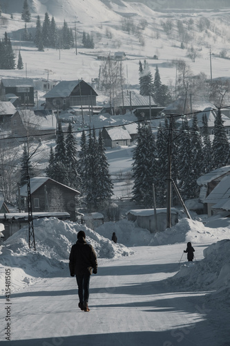 SHEREGESH, RUSSIA - DECEMBER 4, 2018: People walk on frosty Sheregesh