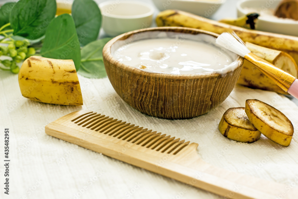Natural homemade hair mask with banana, closeup StockFoto Adobe Stock