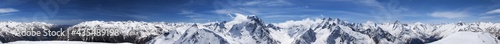 Cylindrical panorama 360 degrees of high snow-capped mountain peaks
