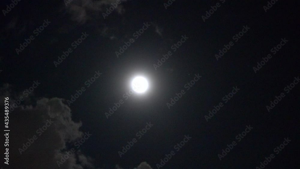 Grayish Clouds Move Away From Full White Moon In Center Frame 002 Grayish Clouds Move Away From Full White Moon In Center Frame 002