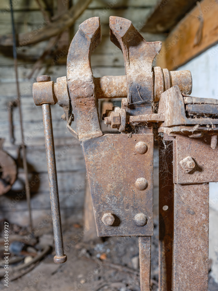 old workshop smith details with rusty tools and stone walls