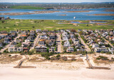Aerial view over Nassau County on Long Island New York with community of homes in view