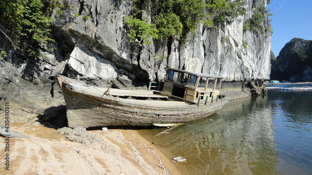 Abandoned boat on a small beach in Vietnam