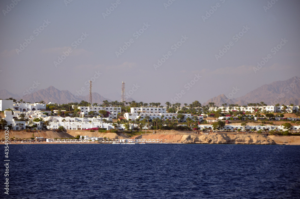 Resorts and hotels at coast of Sharm El Sheikh from yacht. Egypt 