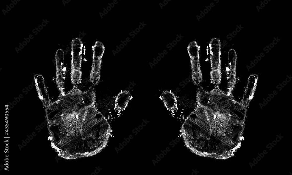 handprint from flour on a black background handprint from flour on a black background