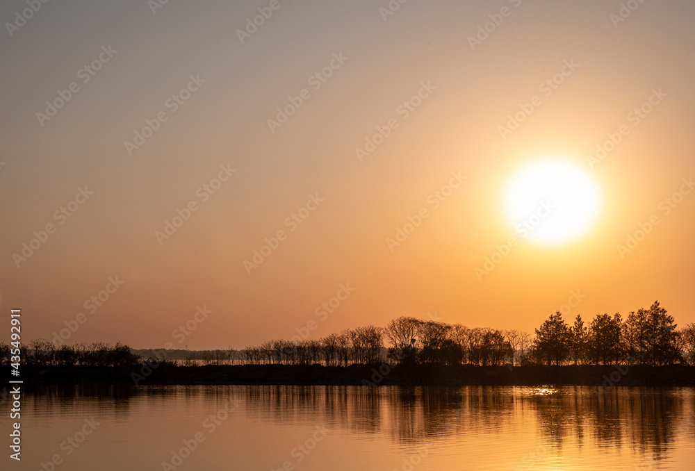 A Blazing Sun Over Lake Couchiching During a Spring Morning Golden Hour in Orillia, Ontario
