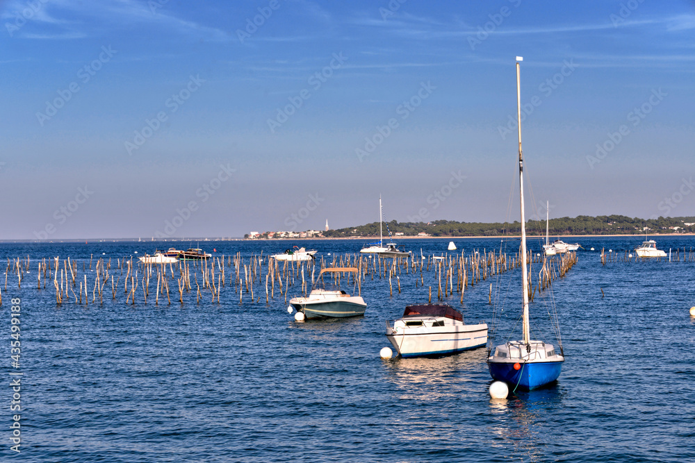 Oyster farming and boats at Cap-Ferret, a commune is a located on the shore of Arcachon Bay in the Gironde department in Aquitaine in southwestern France