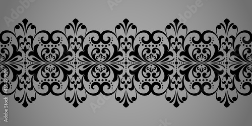 Wallpaper in the style of Baroque. Modern vector background. Black and gray floral ornament. Graphic pattern for fabric, wallpaper, packaging. Ornate Damask flower ornament